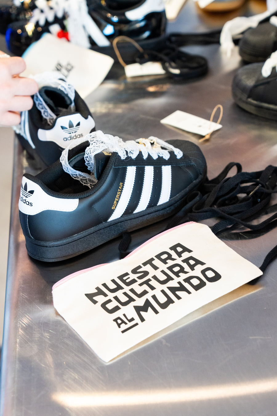 VidaKush Brings the Shoelery Bar to Shoe Palace x Adidas “Nuestra Cultura” Event